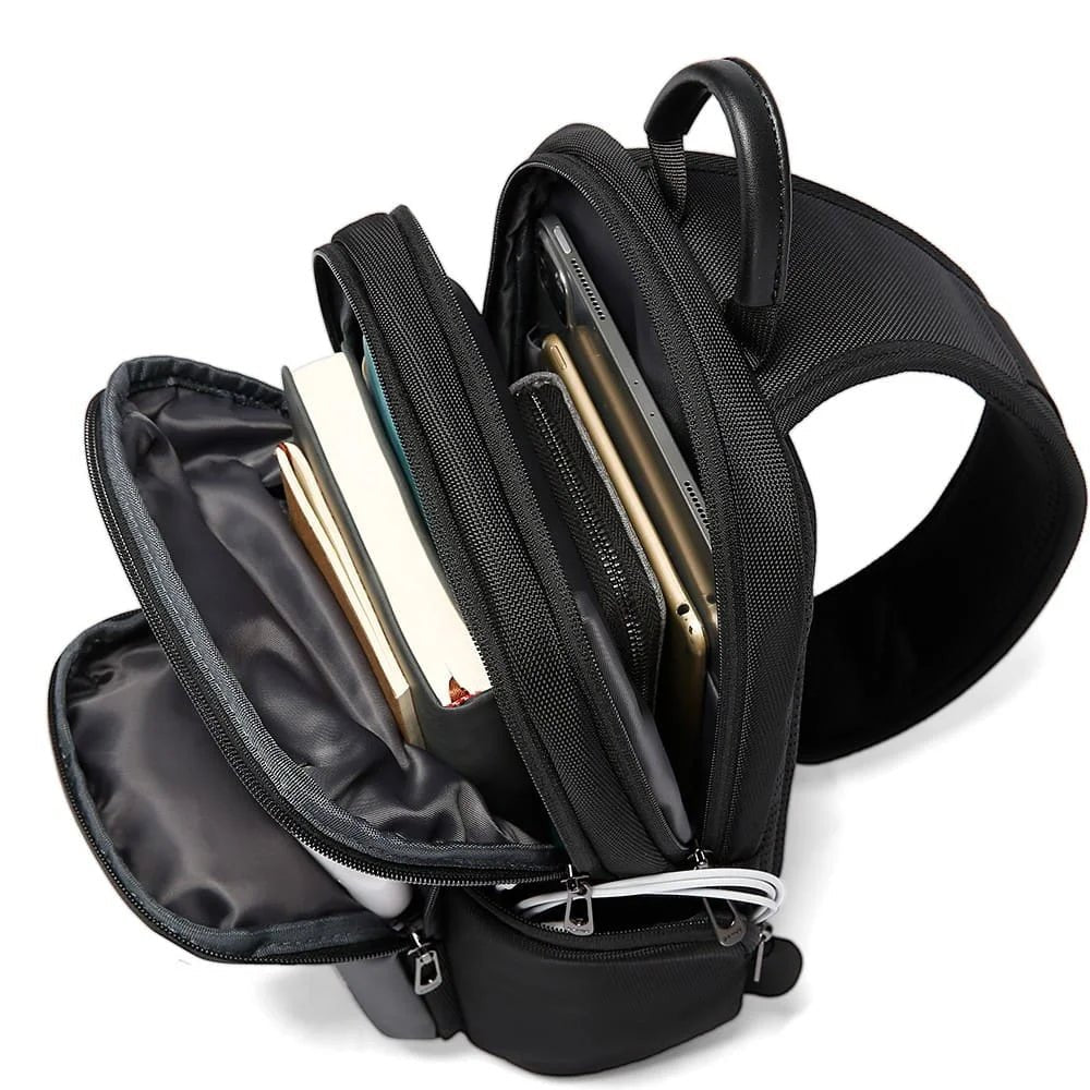 Cyvox BANGE BG‑7718 sling bag interior view, multiple compartments for phone, wallet, keys, and small accessories, organized and practical