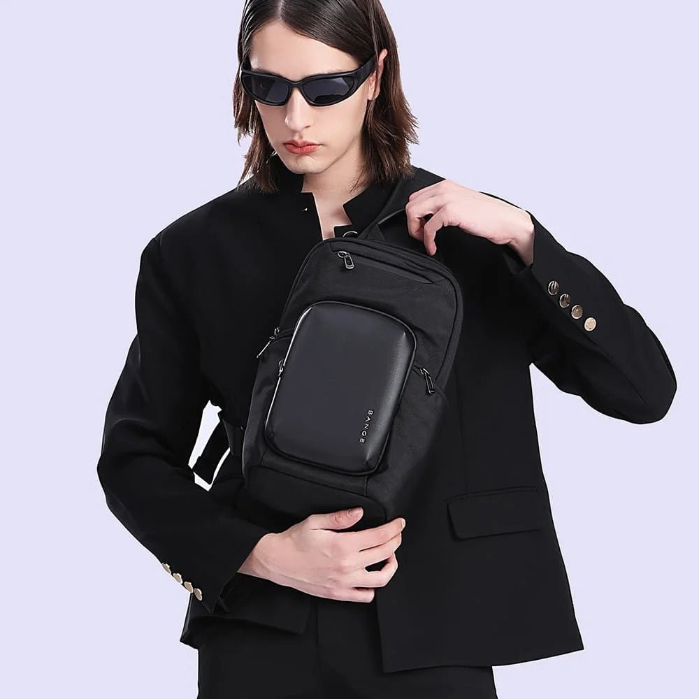Cyvox BANGE BG‑7718 black sling bag worn across body outdoors, ergonomic strap and compact design, ideal for commuting, travel, and casual use