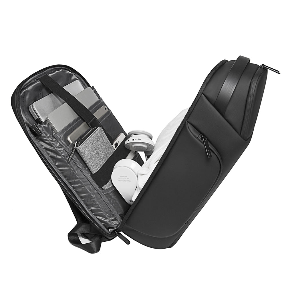 Bange 7277 Black backpack open to reveal organized interior, featuring compartments holding laptops