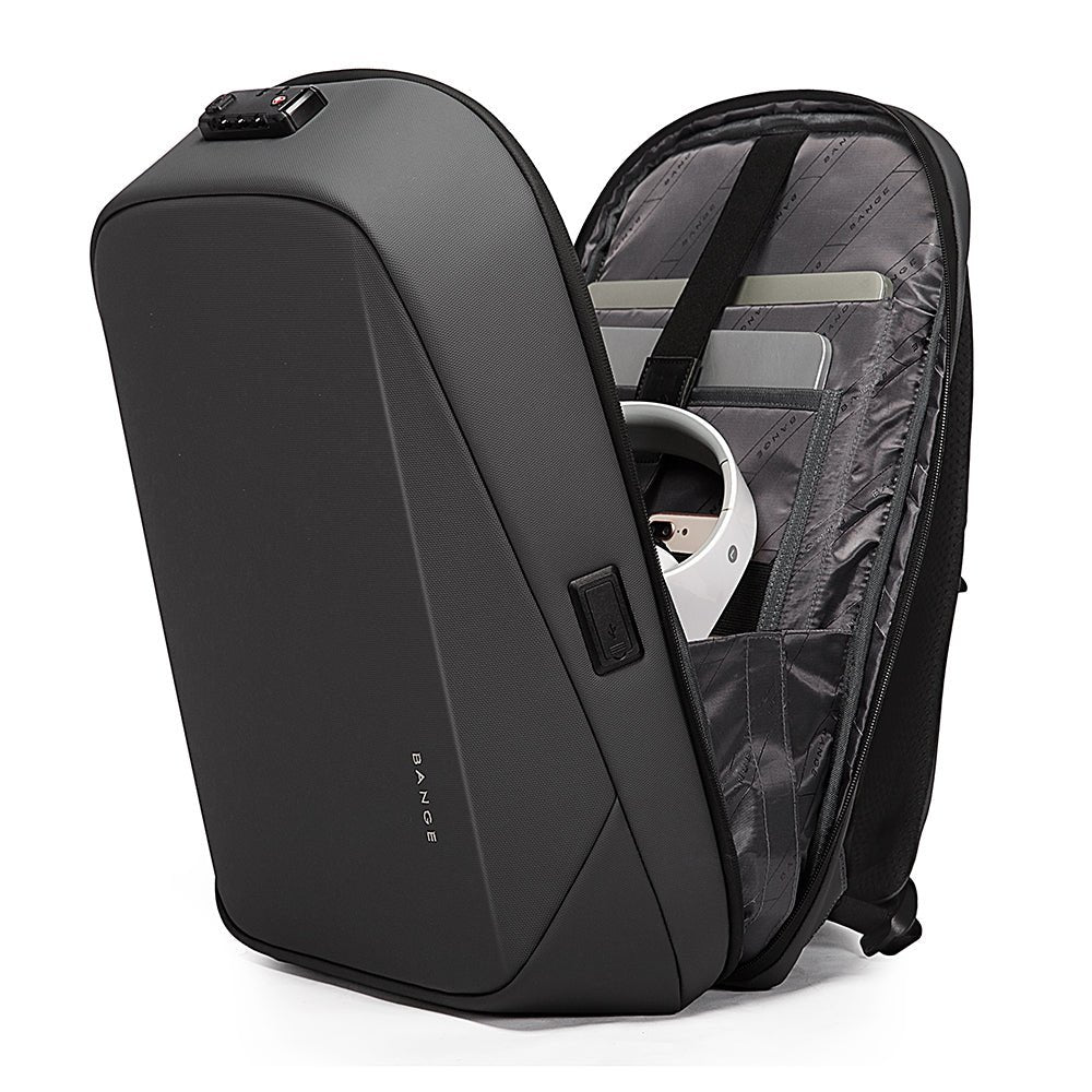 Open grey BANGE backpack with TSA lock, USB port, and organized storage for tech and headphones.