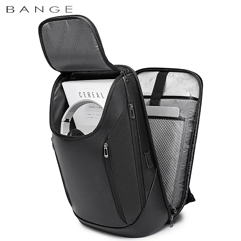 Open front view of the BANGE 6623 leather anti-theft laptop backpack showing organized interior compartments with a magazine, headphones, tablet sleeve, and mesh pockets on a white background
