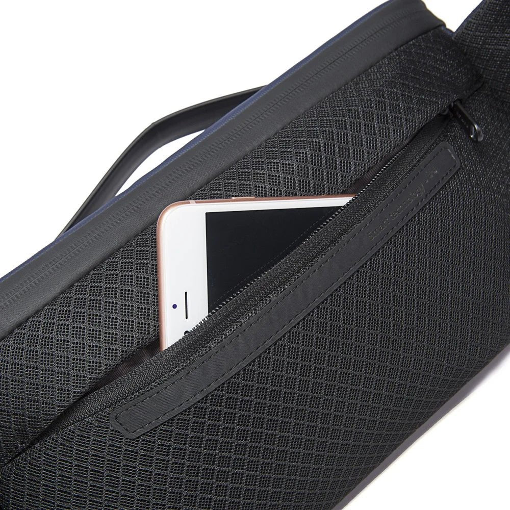 Close-up of waterproof zipper and fabric texture and back compartment on Bange BG-77202 Fonex sling bag